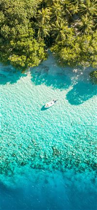 boat near shore wallpaper