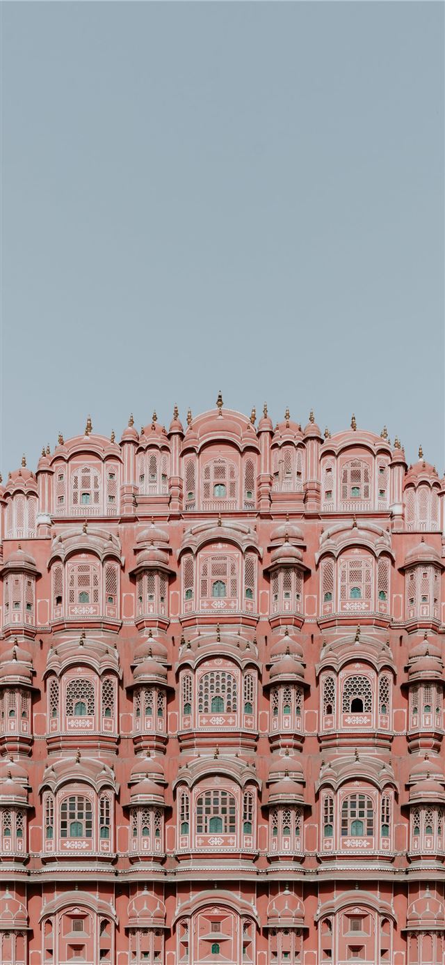 1125x2436 pink and white concrete structure under clear sky - sky iPhone 11 Wallpaper