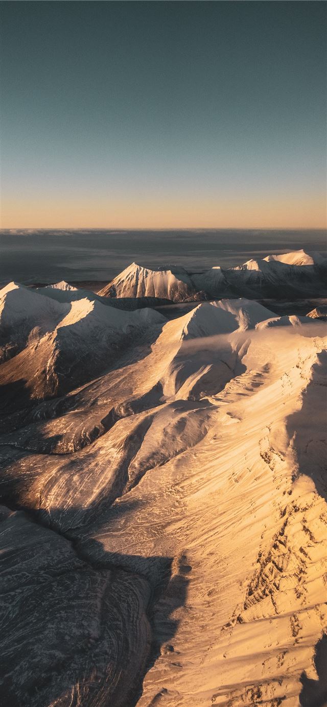 1125x2436 brown and white mountains under blue sky during da... - scenery iPhone 11 Wallpaper
