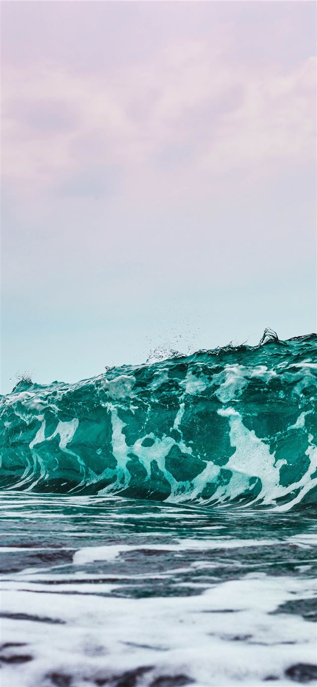 1125x2436 person surfing on sea waves during daytime - water iPhone 11 Wallpaper