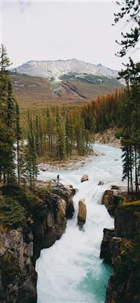 aerial photography of flowing river viewing mounta... wallpaper