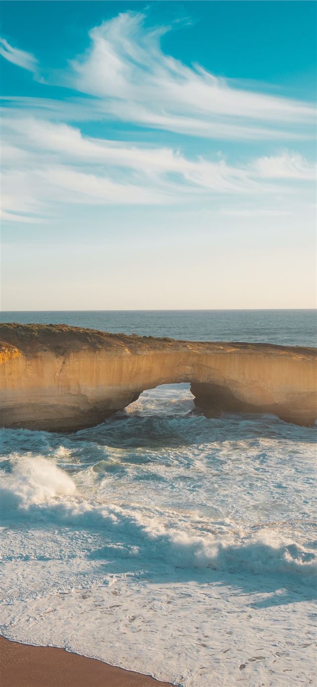 1125x2436 boulders body of water - scenery iPhone 11 Wallpaper
