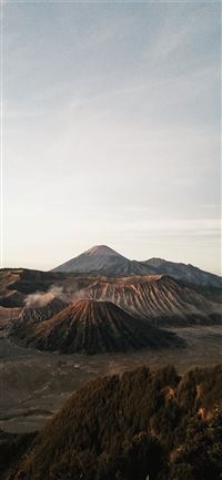 photo of crater and mountain iPhone 11 wallpaper