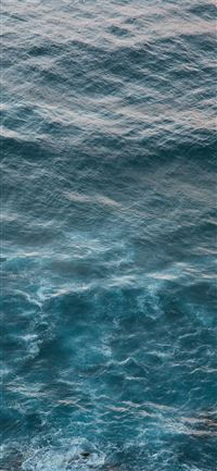 body of water during daytime iPhone 11 wallpaper