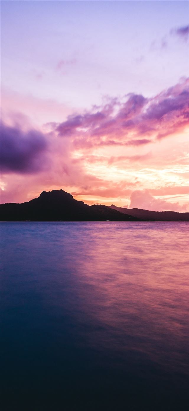 1125x2436 ocean rocks clouds bora bora - 100 most beautiful places to visit iPhone 11 Wallpaper