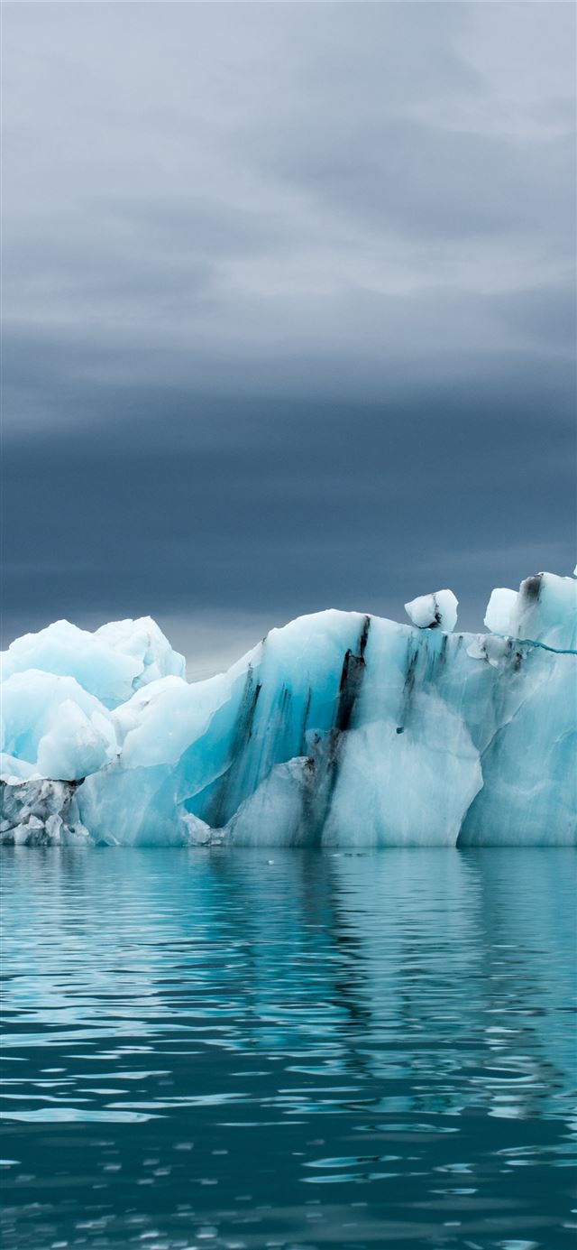 1125x2436 Antarctica iceberg ocean 5k Nature - 100 most beautiful places to visit iPhone 11 Wallpaper