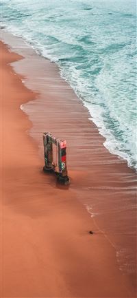 people on beach during daytime iPhone 11 wallpaper