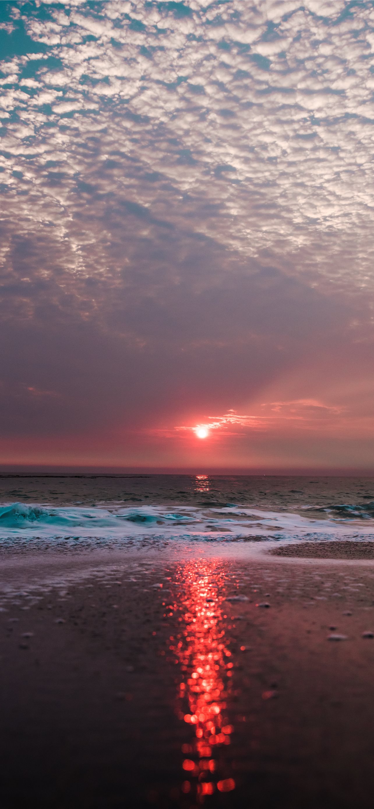 beach under cloudy sky during sunset iPhone wallpaper 