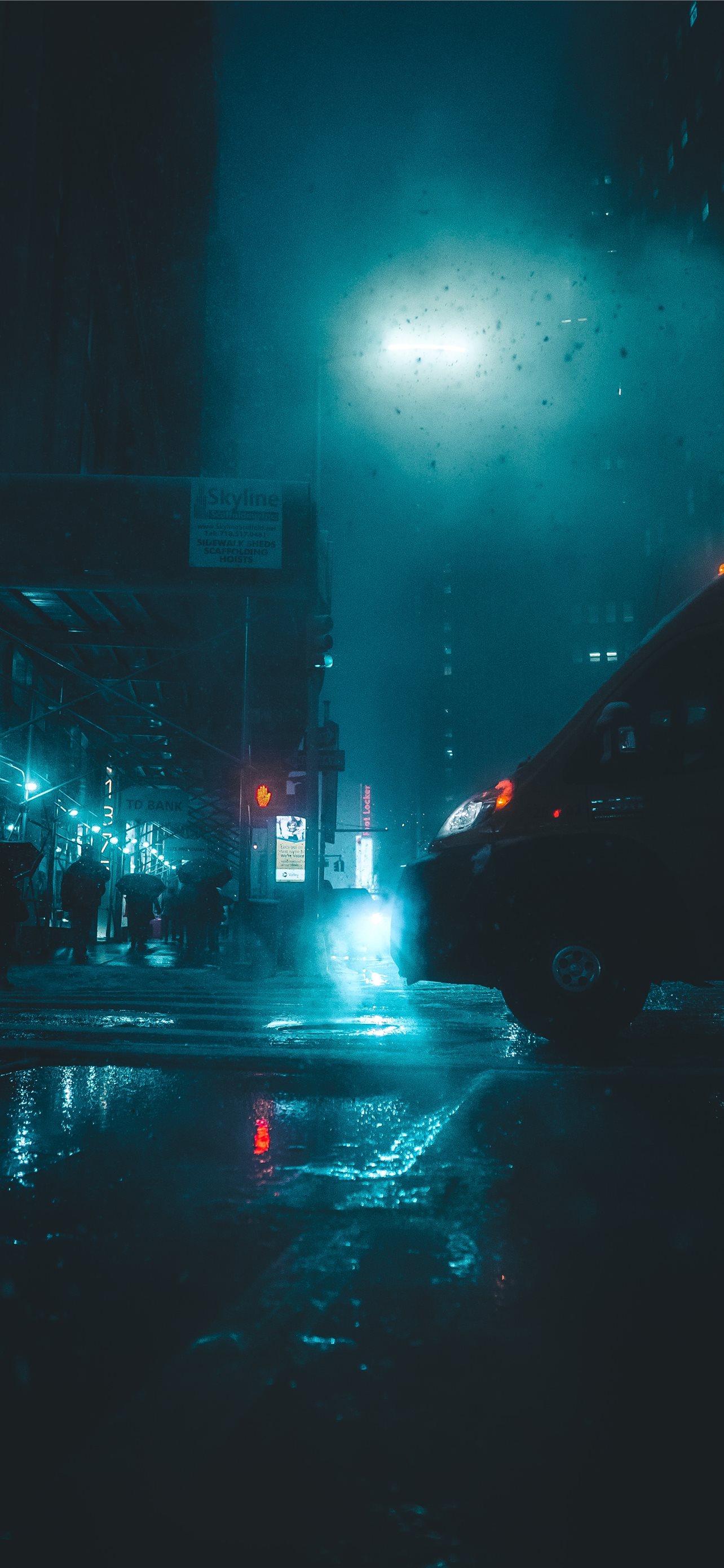 vehicle passing by wet road during nighttime iPhone wallpaper 