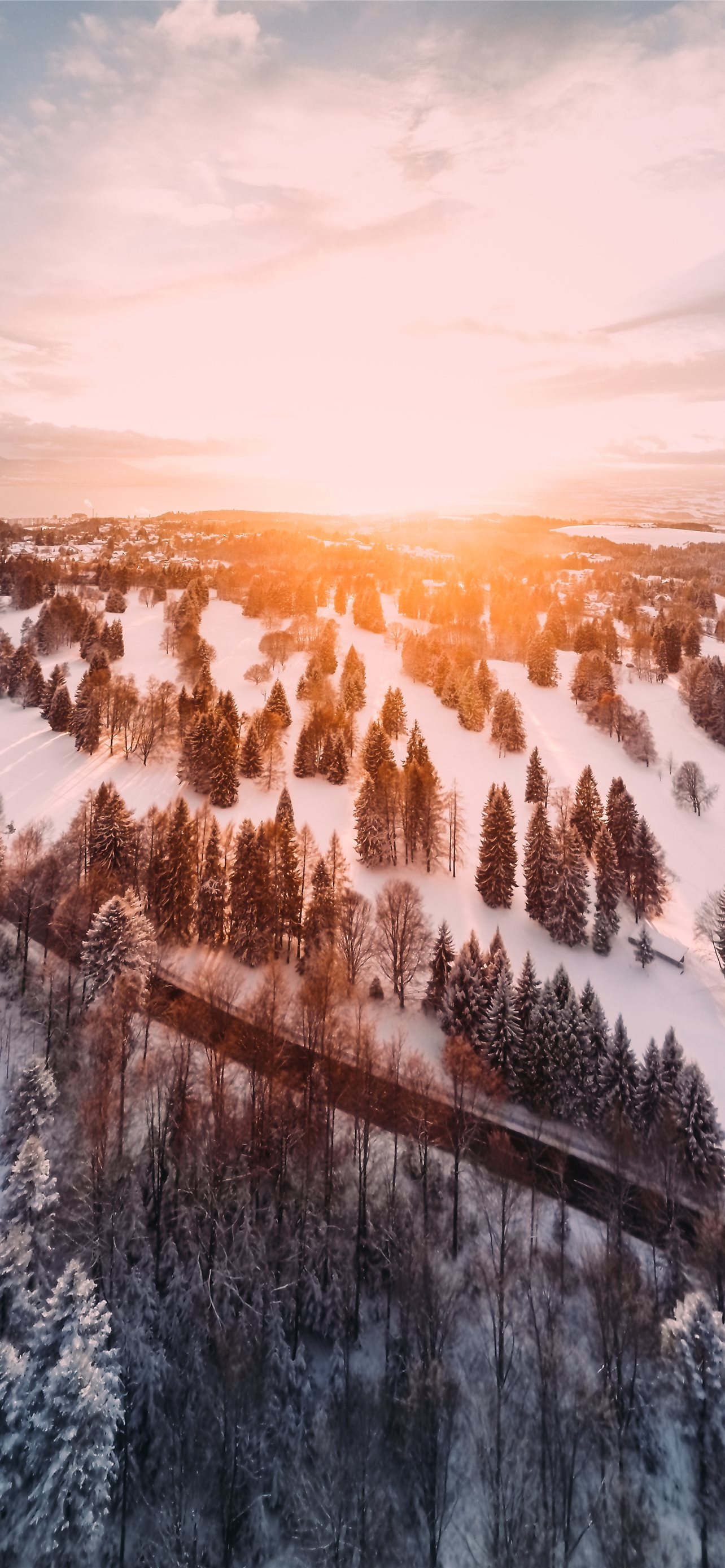 snow covered mountain during sunset iPhone wallpaper 