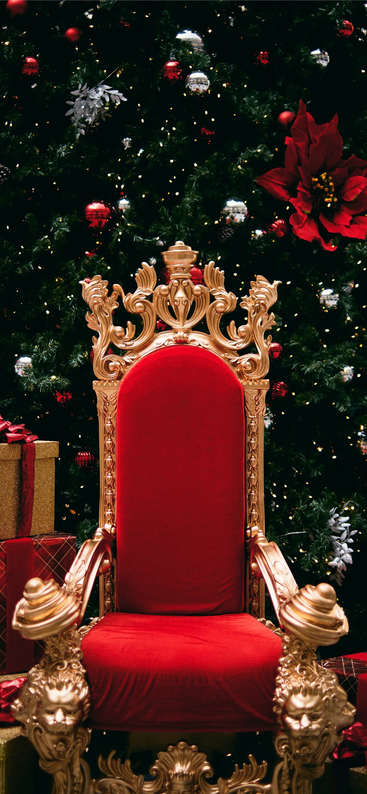 gold and red throne beside gift boxes iPhone wallpaper 