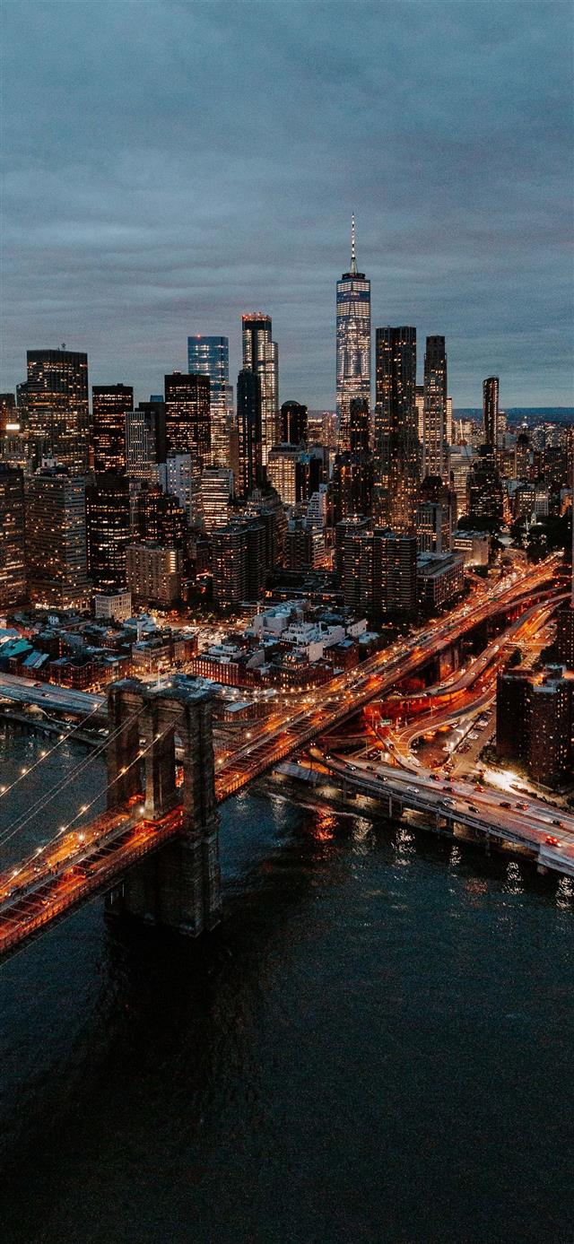 aerial photography of buildings and bridge iPhone 12 wallpaper 