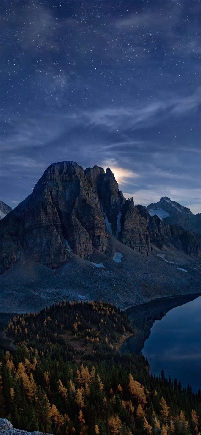 snowy peak starry night landscape iPhone 12 wallpaper 