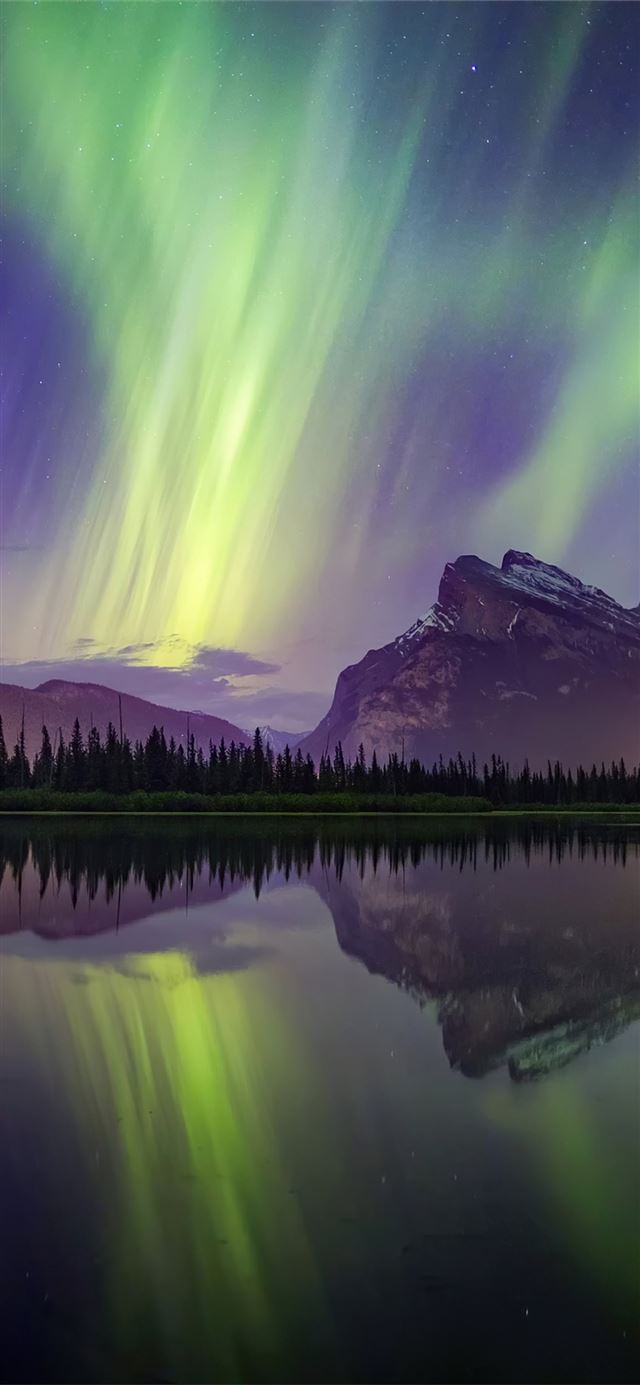 aurora borealis mountains lake reflection banff na... iPhone 12 wallpaper 