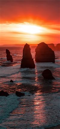the twelve apostles coastline rock sunset 5k wallpaper