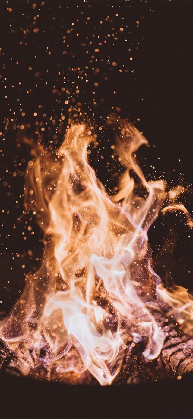 close up photo of fire at nighttime iPhone 12 wallpaper 