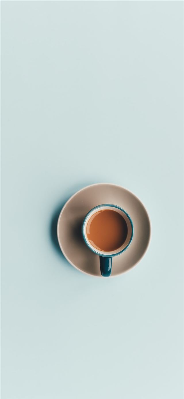 blue ceramic coffee cup and white saucer iPhone 12 wallpaper 