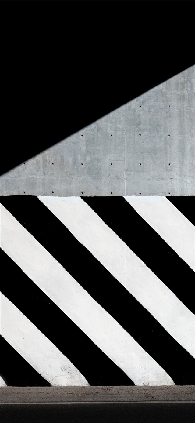 white and black diagonal striped paint on wall iPhone 12 wallpaper 