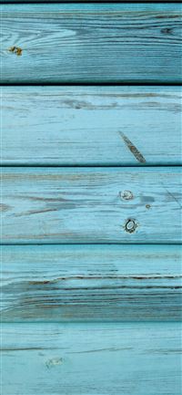 close up photo of green planks wallpaper