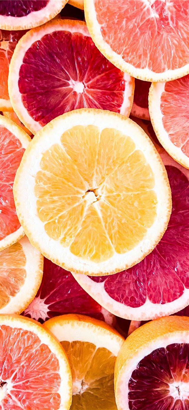 sliced grapefruits iPhone 12 wallpaper 