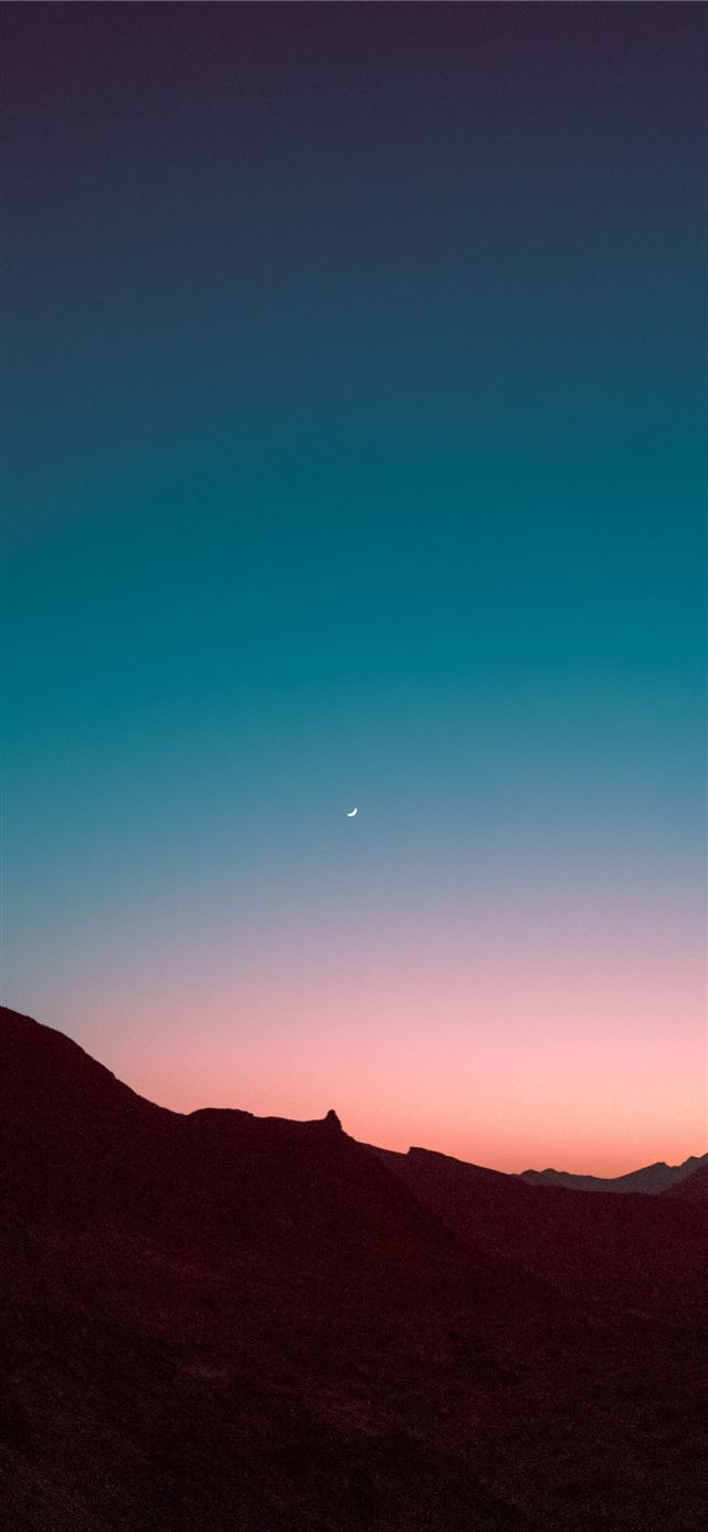 silhouette of mountains during sunset iPhone 12 wallpaper 