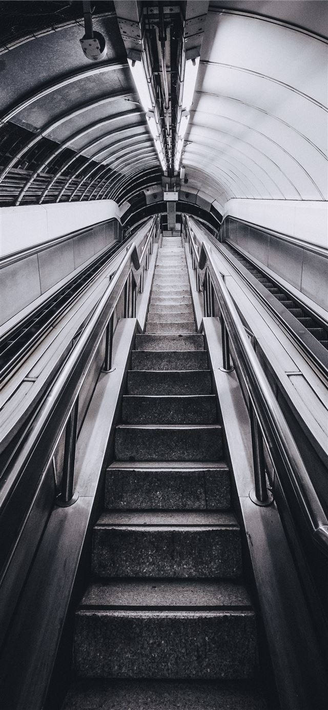 grayscale photo of escalator iPhone 12 wallpaper 