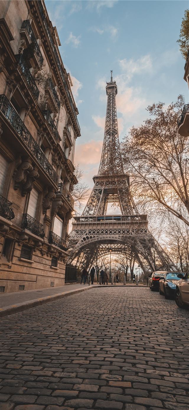 Eiffel Tower under blue sky during daytime iPhone 12 wallpaper 