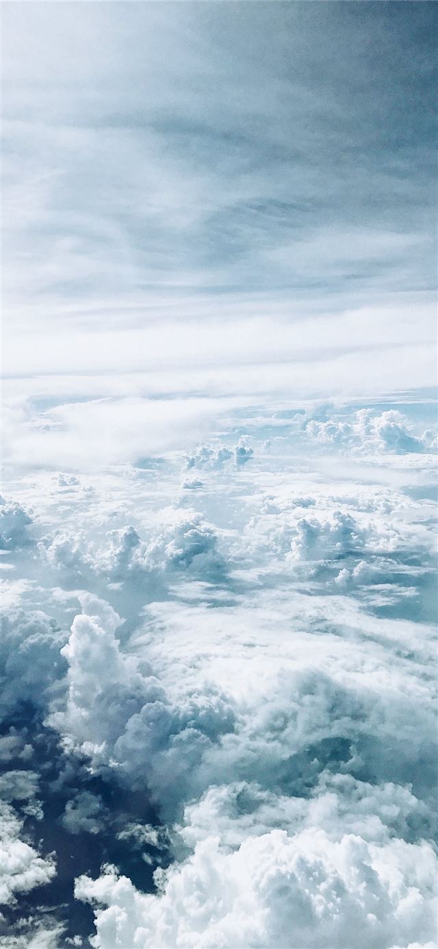 sea of clouds during daytime iPhone 12 wallpaper 