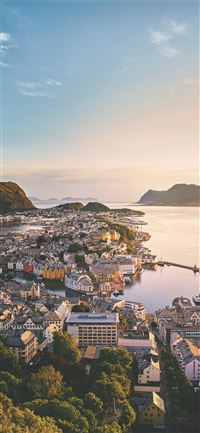 aerial photography of houses between body of water... wallpaper