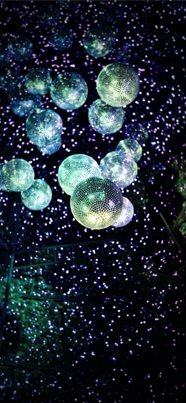lighted hanging disco mirror balls iPhone 12 wallpaper 