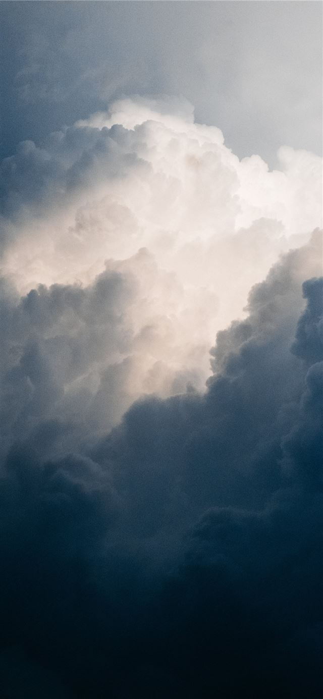 clouds in shallow focus iPhone 12 wallpaper 