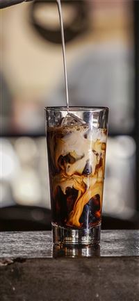 selective focus photography of milk pouring on sho... wallpaper