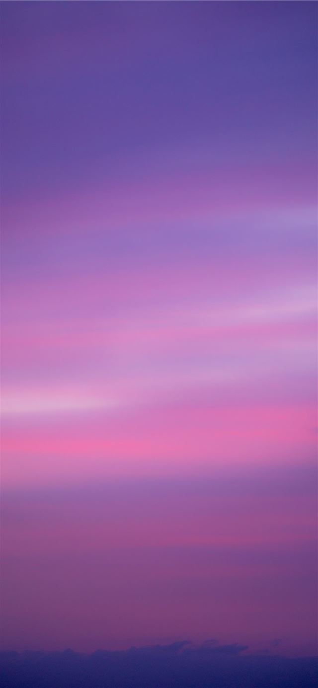 pink and white clouds iPhone 12 wallpaper 