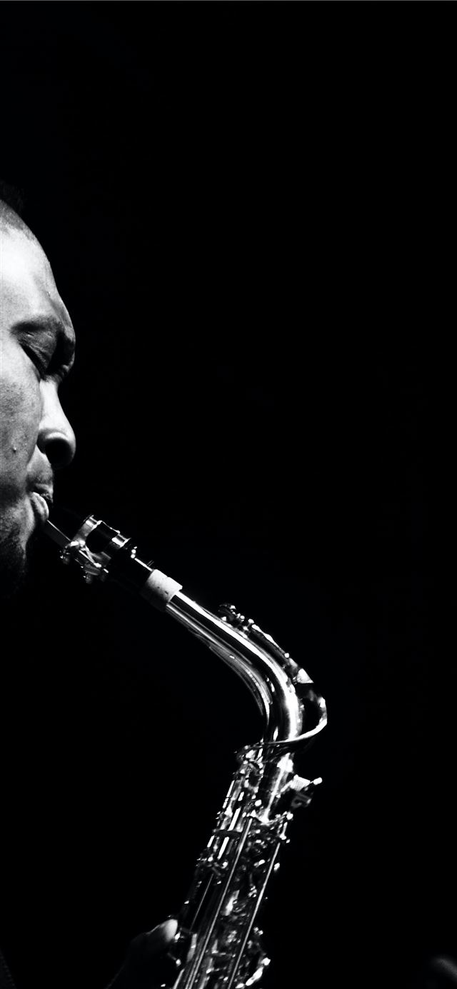 man playing saxophone iPhone 12 wallpaper 