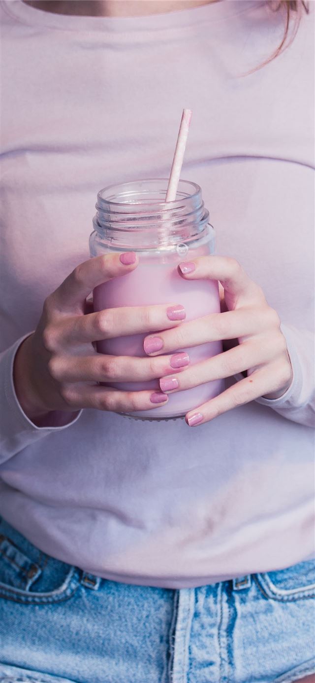 unknown person holding glass jar iPhone 12 wallpaper 