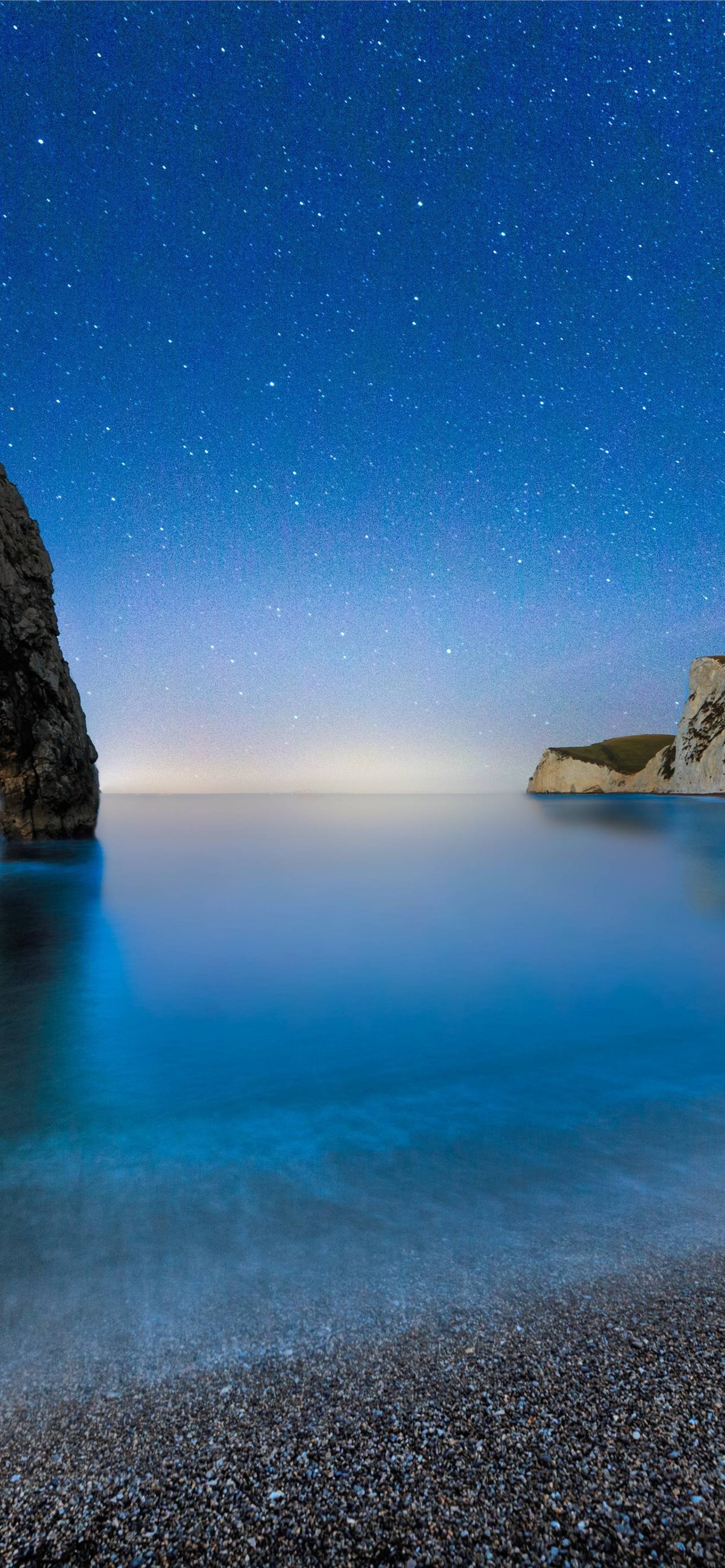 Durdle Door 5k 4k beach night stars sea England Na... iPhone Wallpapers  Free Download