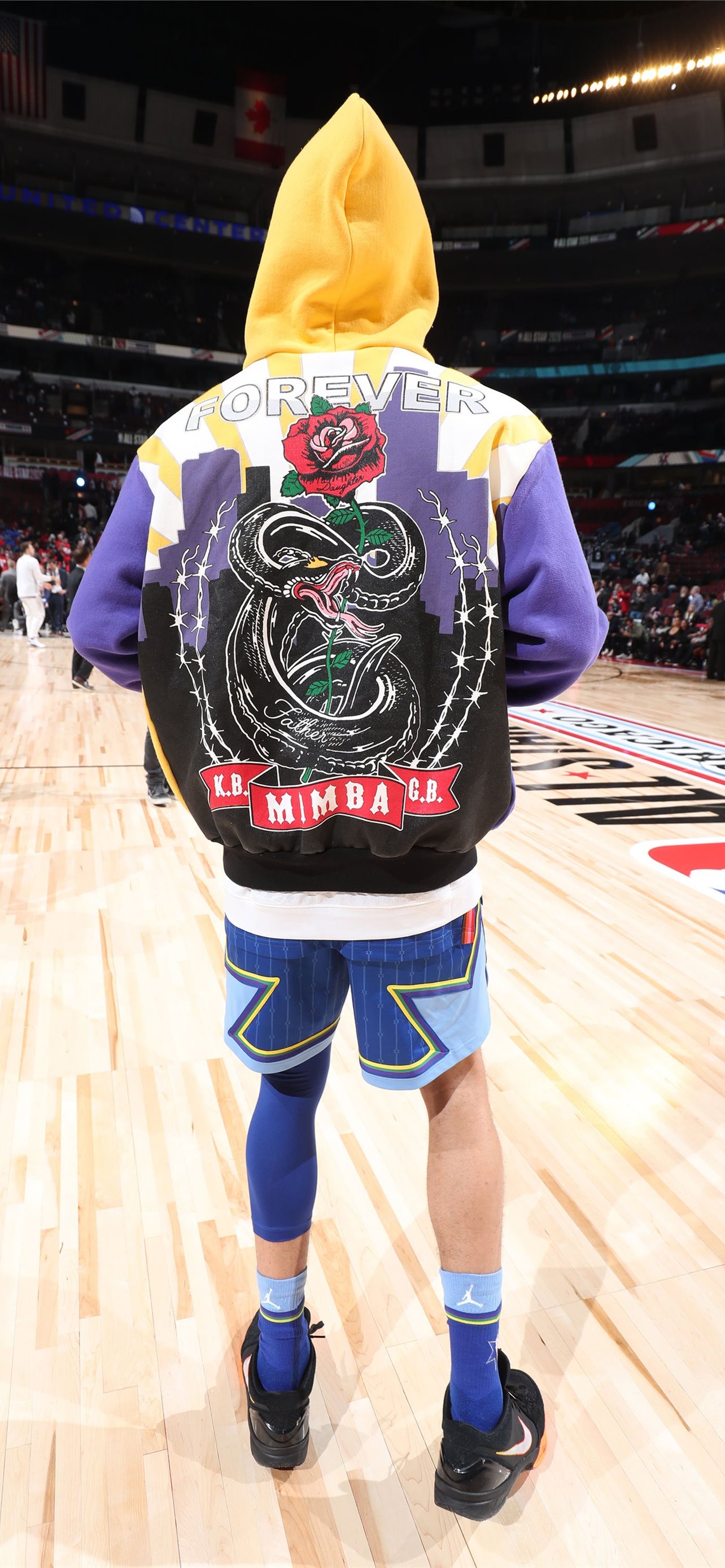 Download Devin Booker NBA AllStar and Phoenix Suns guard exhibiting  strength of his team mascot Wallpaper  Wallpaperscom