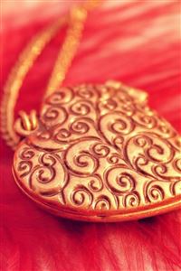 Pure Love Golden Pendant Red Feather wallpaper