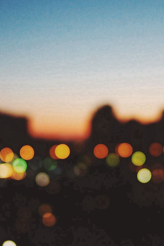 640x960 Light Bokeh Sunset City Scene - flare iPhone 4s Wallpaper