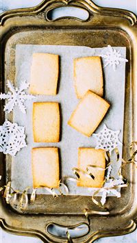 brass tray on white marble surface wallpaper