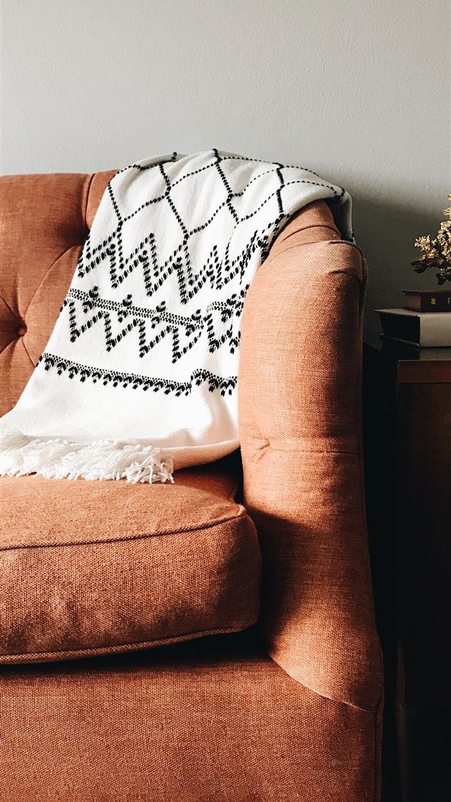 1080x1920 white and black textile on brown couch - gray iPhone 8 Wallpaper