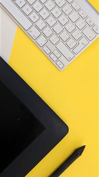 gray Apple wireless keyboard beside black tablet c... wallpaper