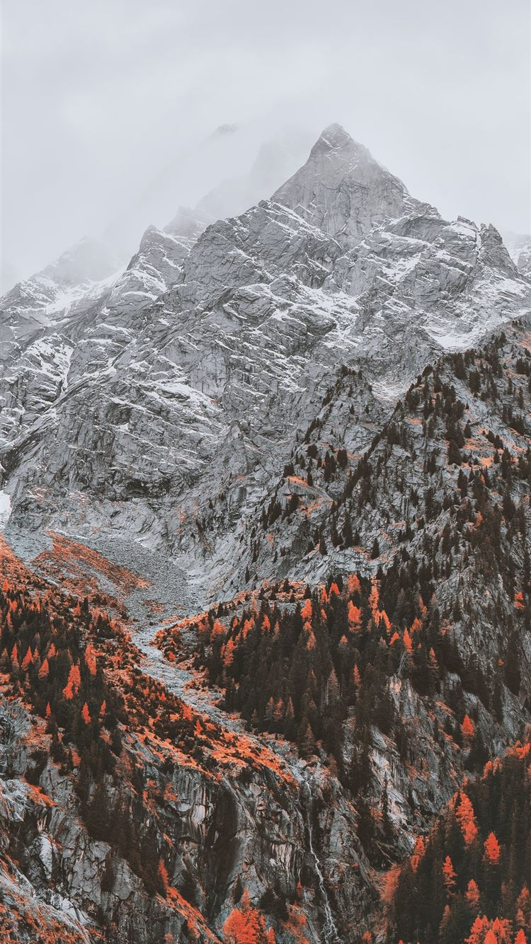 gray mountain under white sky iPhone 8 wallpaper 