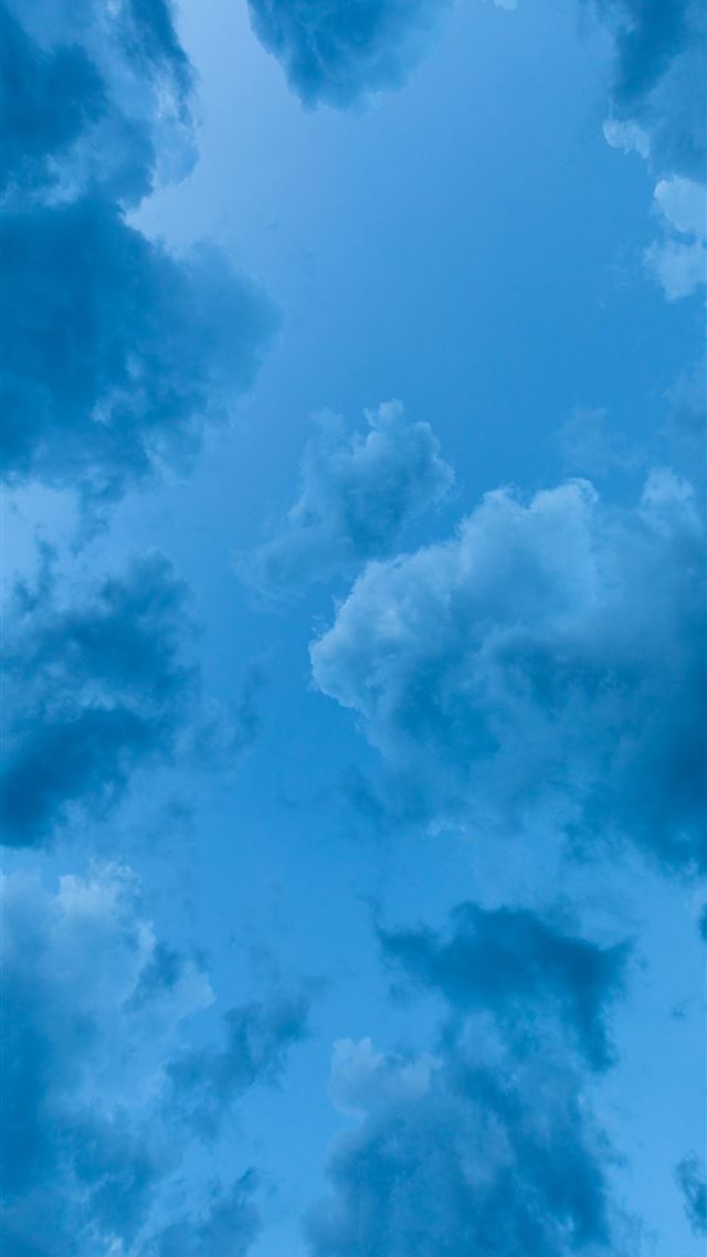 1080x1920 low angle view of blue clouds - sky iPhone 8 Wallpaper