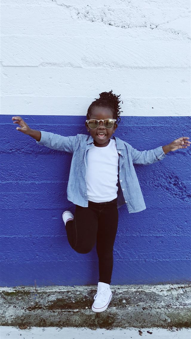 1080x1920 girl leaning on wall during daytime - black iPhone 8 Wallpaper