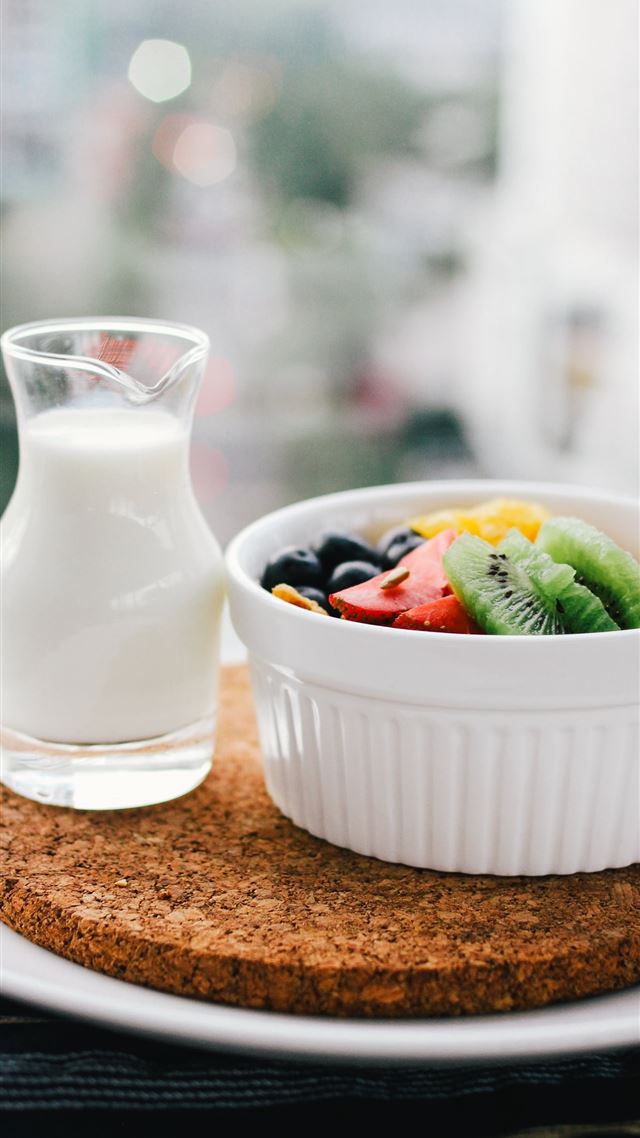 1080x1920 fruit salad inside bowl beside glass of milk on br... - health iPhone 8 Wallpaper