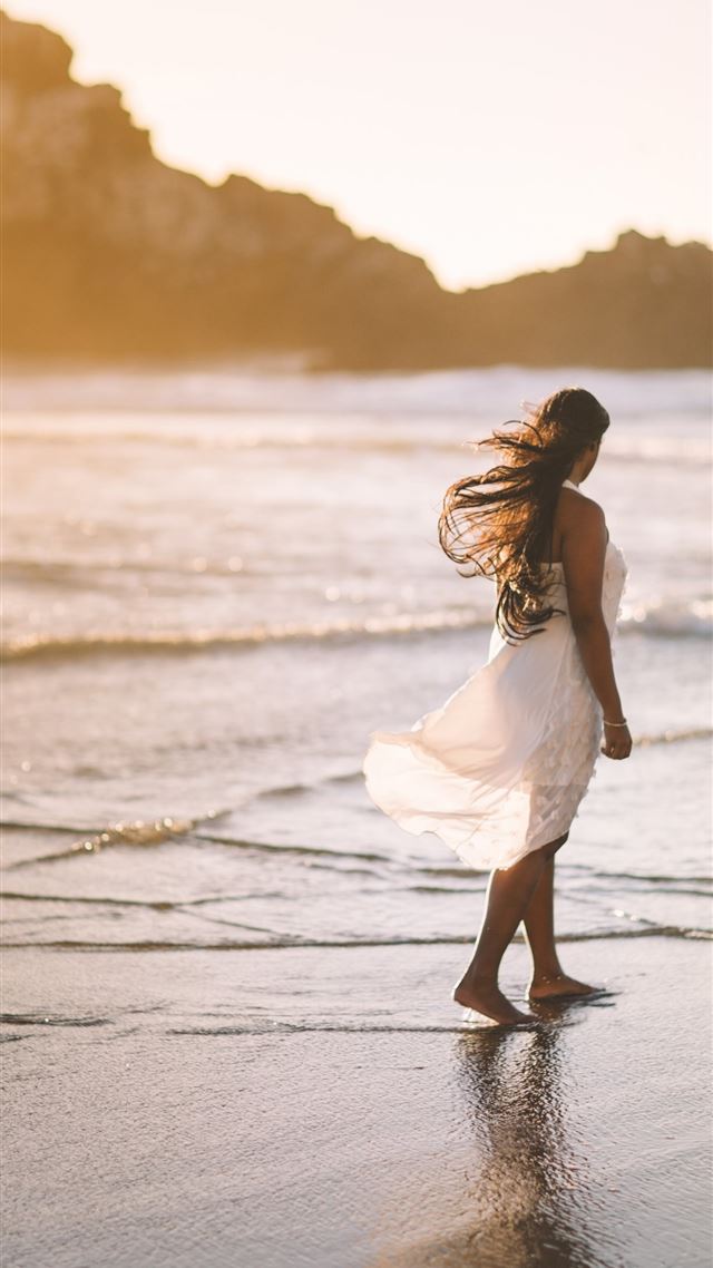 1080x1920 selective focus photo of woman standing on sea sho... - san francisco iPhone 8 Wallpaper