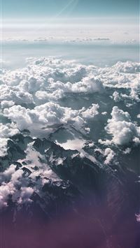 mountain under sea of clouds wallpaper