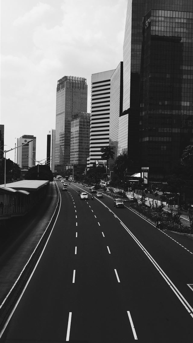 1080x1920 grayscale photo of vehicle running on road under b... - road iPhone 8 Wallpaper
