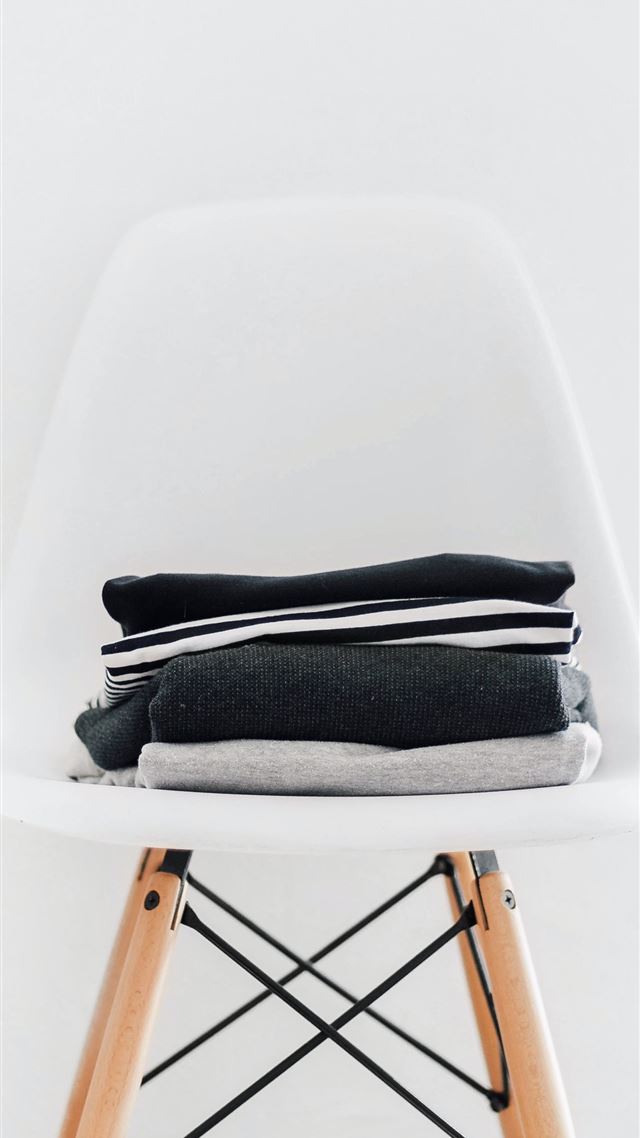 1080x1920 pile of black white and gray textiles on white pad... - website iPhone 8 Wallpaper